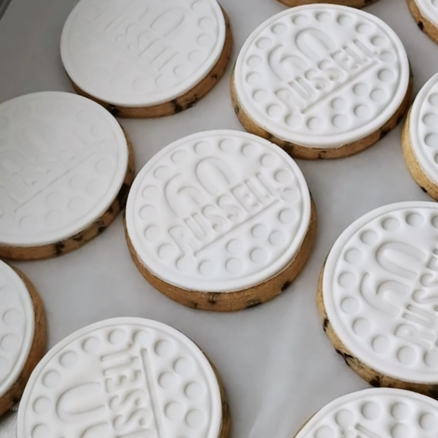 60th birthday cookies on tray overhead view