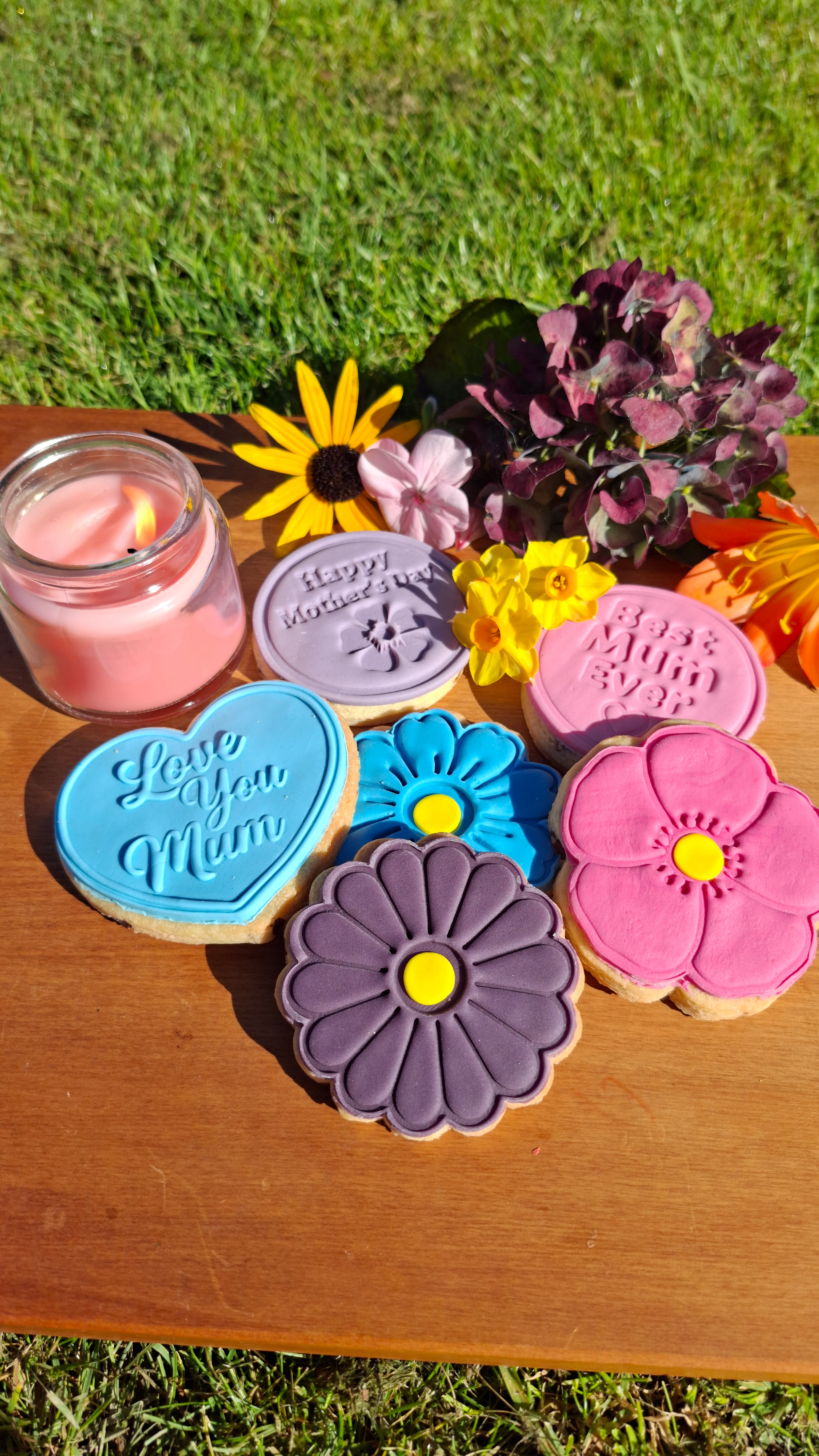 Mother's Day cookies with candle outdoors
