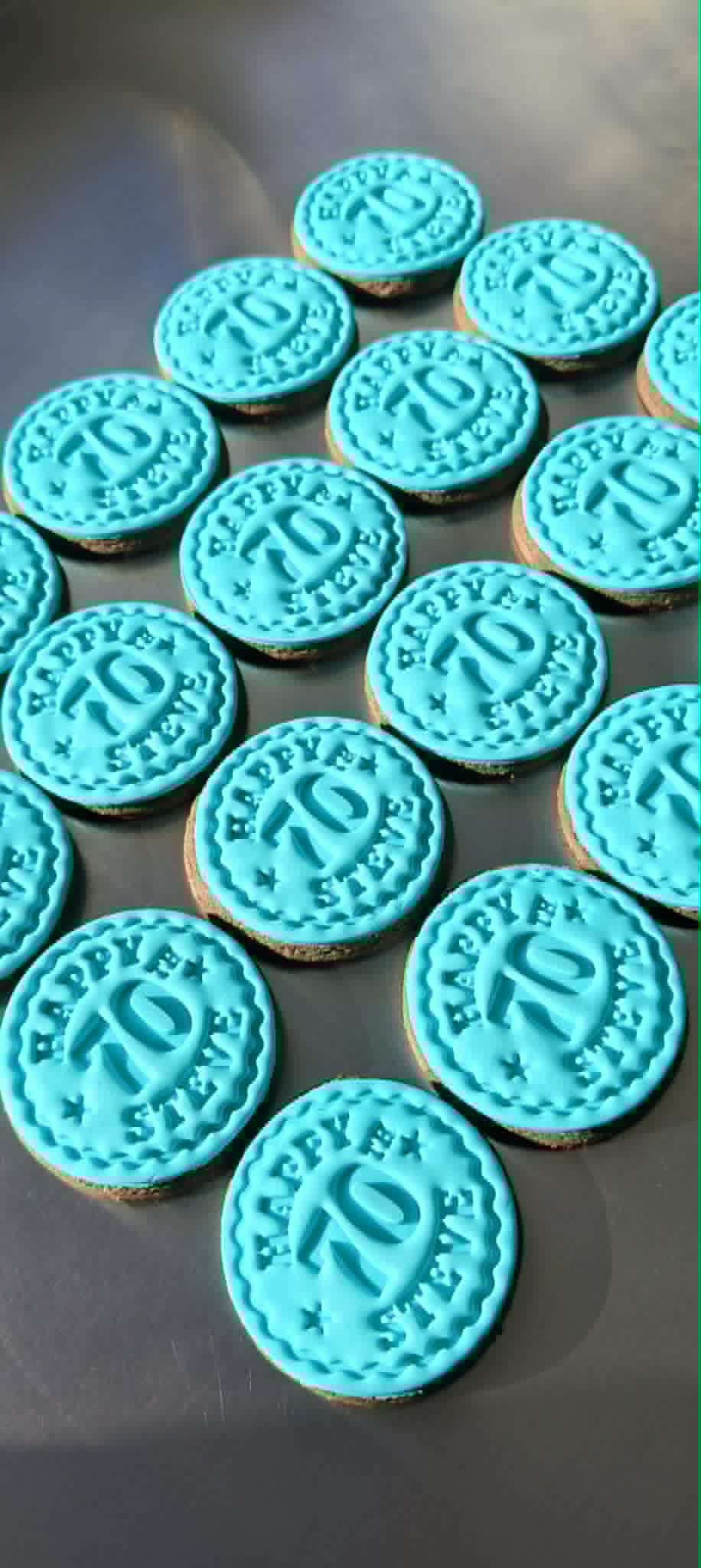 Steve's 70th birthday cookies on bench